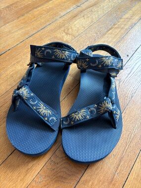 Teva Navy Blue Sandals with Gold Sun Print